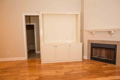 ADJACENT TO THE CORNER FIREPLACE IS THIS ATTRACTIV