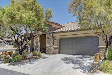 View of front of home with stucco siding, concrete