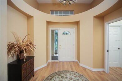 Entrance foyer with high ceiling and pocket door t