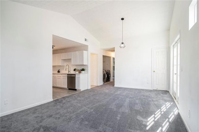 Unfurnished living room featuring visible vents, b