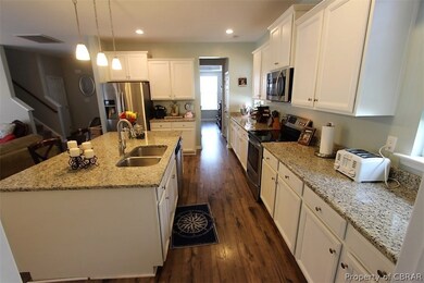 Lots of cabinetry, 2 pantries, and Stainless Appli