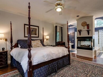 Master Bedroom with see through gas fireplace