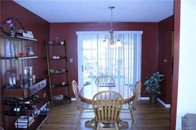 Dining room with sliding glass doors onto the back