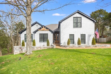 New retaining wall, landscaping, and windows