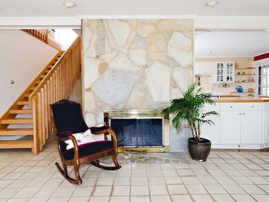 Other. The dominant stone chimney is...