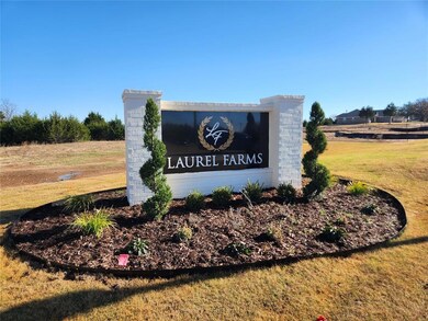 Community sign with a lawn