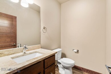 Main Floor Half Bath with Big Mirror and Granite C