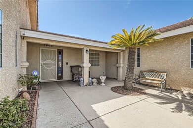 Property entrance with stucco siding