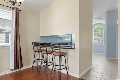 Interior space with indoor wet bar, a textured cei