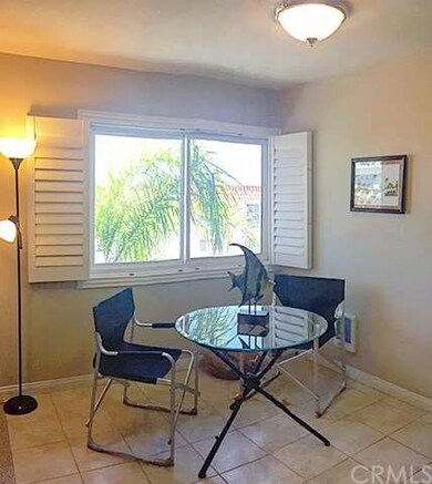 Eating area off of living room and kitchen with vi