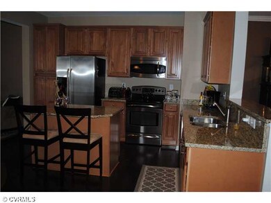 Kitchen - Hardwood floors, granite and stainless s