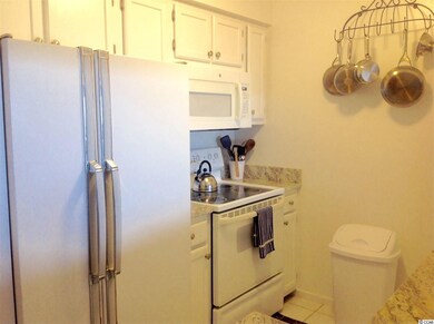 Granite countertops, tile flooring.