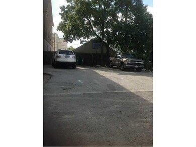 Exterior Back. OFF STREET PARKING FOR 3 CARS