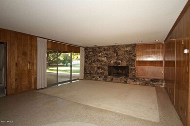 Large family room with rock fireplace