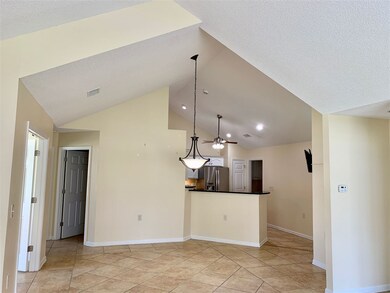 Wall-mount tv.  Open to family room.