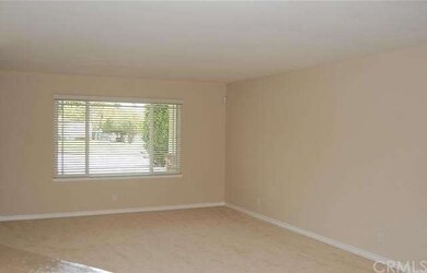 Neutral decor and ample wall space for artwork.