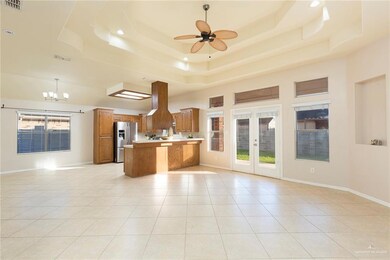 This angle helps to appreciate the size of the open living room and kitchen areas.