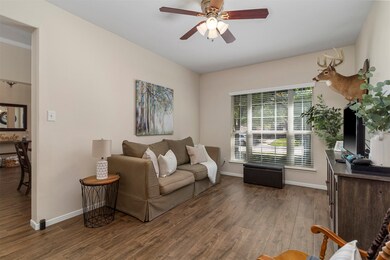 Flexible space just off dining room being used as a home office and tv room. 