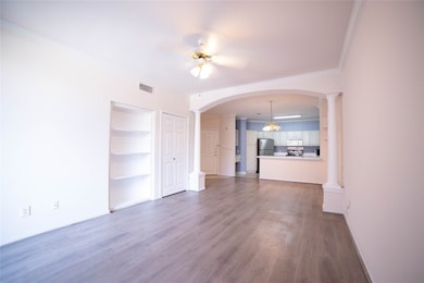 This photo showcases a spacious, open-concept livi