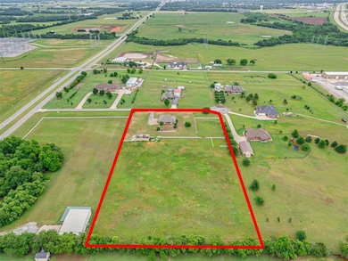 View of rural area with property parcel outlined and agricultural land