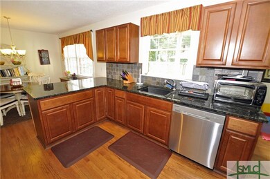 OPEN KITCHEN WITH GRANITE COUNTERS, STAINLESS APPL