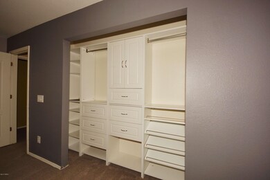 Master bedroom closet organizer.