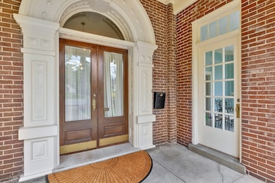 The detail of the incredible trim work around the front door is just a testament to the workmanship that went into building this home in 1881.