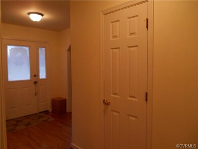 Foyer with Wood Floors