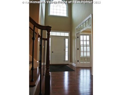 Exterior Front. Two Story foyer and beautiful stai