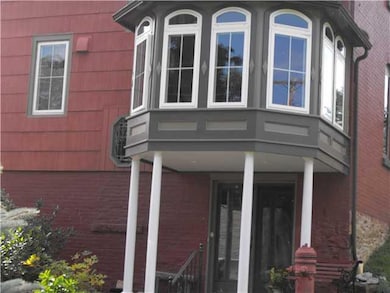 Exterior Back Sunroom adjacent to kitchen-lower gl