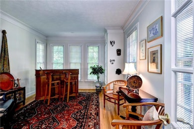 Formal living room or office with French doors