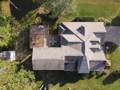 Expansive deck to enjoy with family and friends. Storage barn stays.