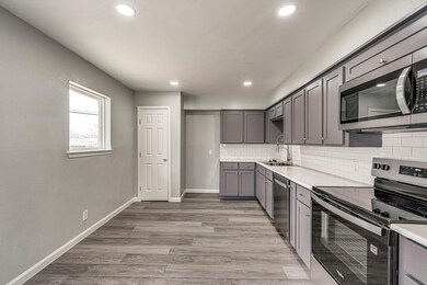 Updated cabinets and stainless appliances