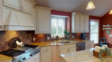 Gourmet kitchen  with upgraded appliances, bisque 