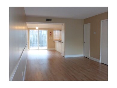 Large spacious living room.  New laminate floors. 