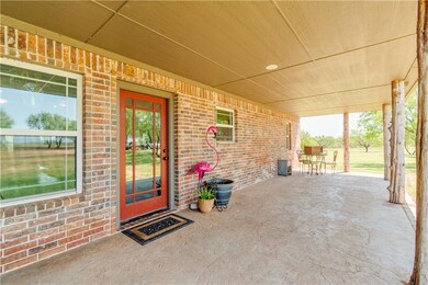Back Porch View w/ Rustic Log Columns