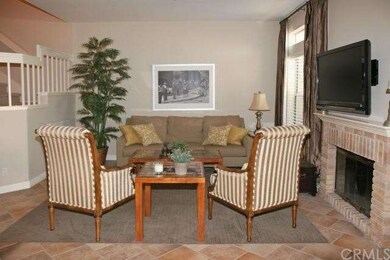 Open area and fireplace with great tile