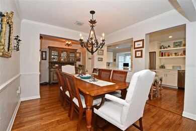 Dining Room with Kitchen in Background