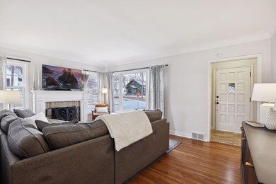 Main level living room flooded with natural light