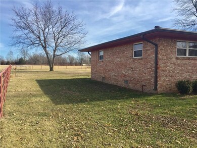 Well maintained  home with lots of pipe fencing.