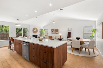 Kitchen featuring light wood-style floors, a larg