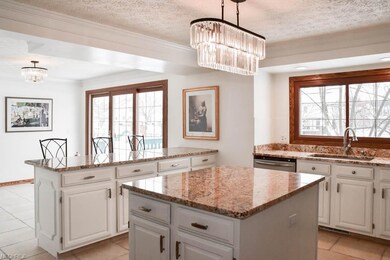 Kitchen island and a large peninsula.