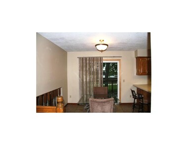 Eat-in kitchen, easy access to spacious deck!