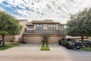 Prairie-style house featuring stucco siding and concrete driveway