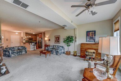 Spacious great room with adjacent sun room area