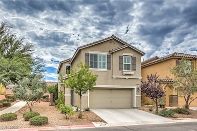 View of front of home with stucco siding, concrete driveway, a garage, and a tile roof