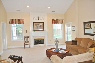 Main living room. Gas fireplace. Lots of natural l