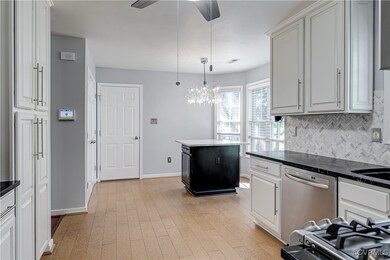 Renovated kitchen with soapstone countertops, SS a