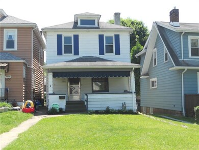 House sits back from road on table top flat lot