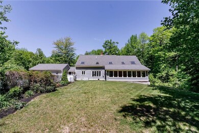 Large back yard abuts tree-growth...